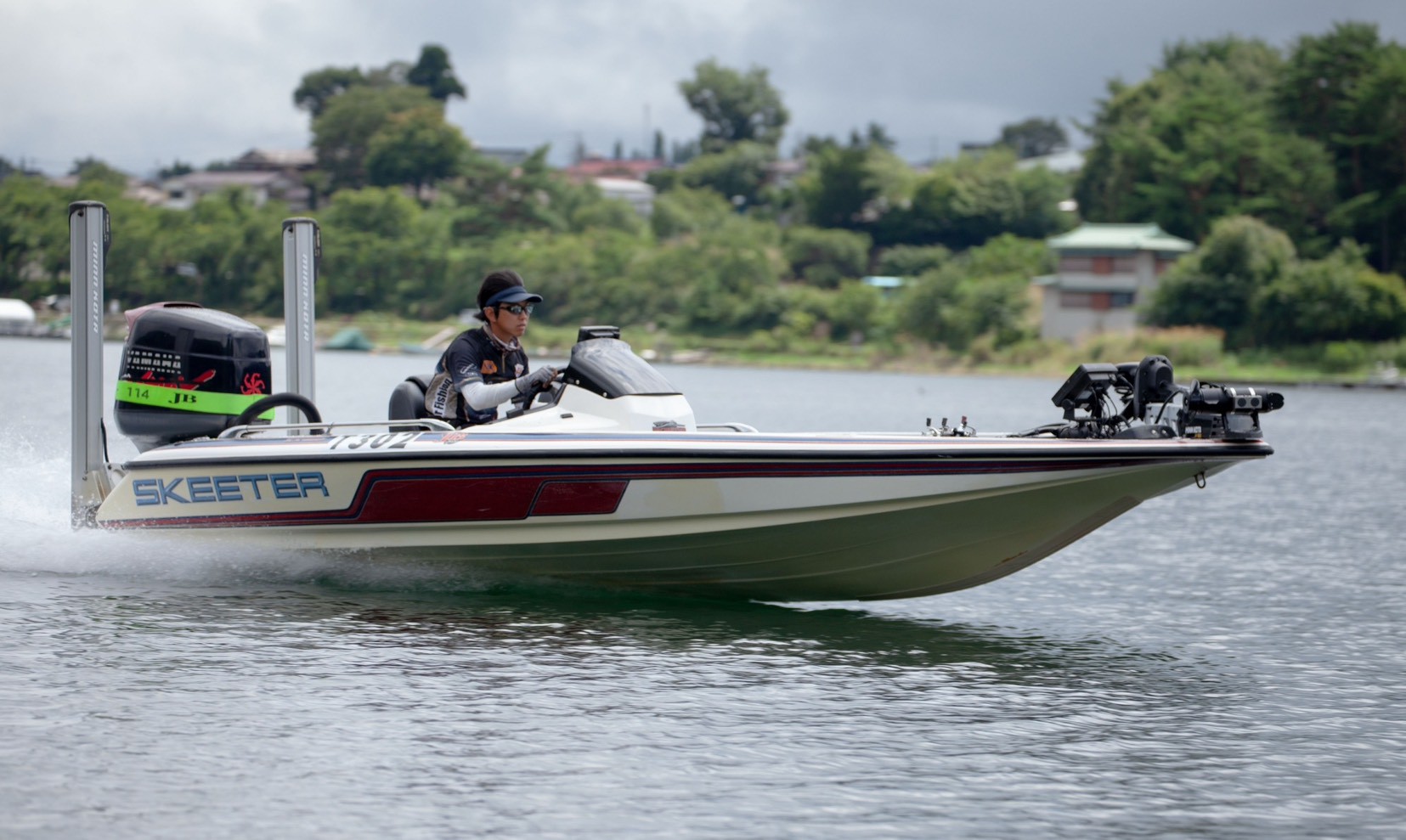Takumi Harada running his Skeeter bass boat on Lake Kawaguchi